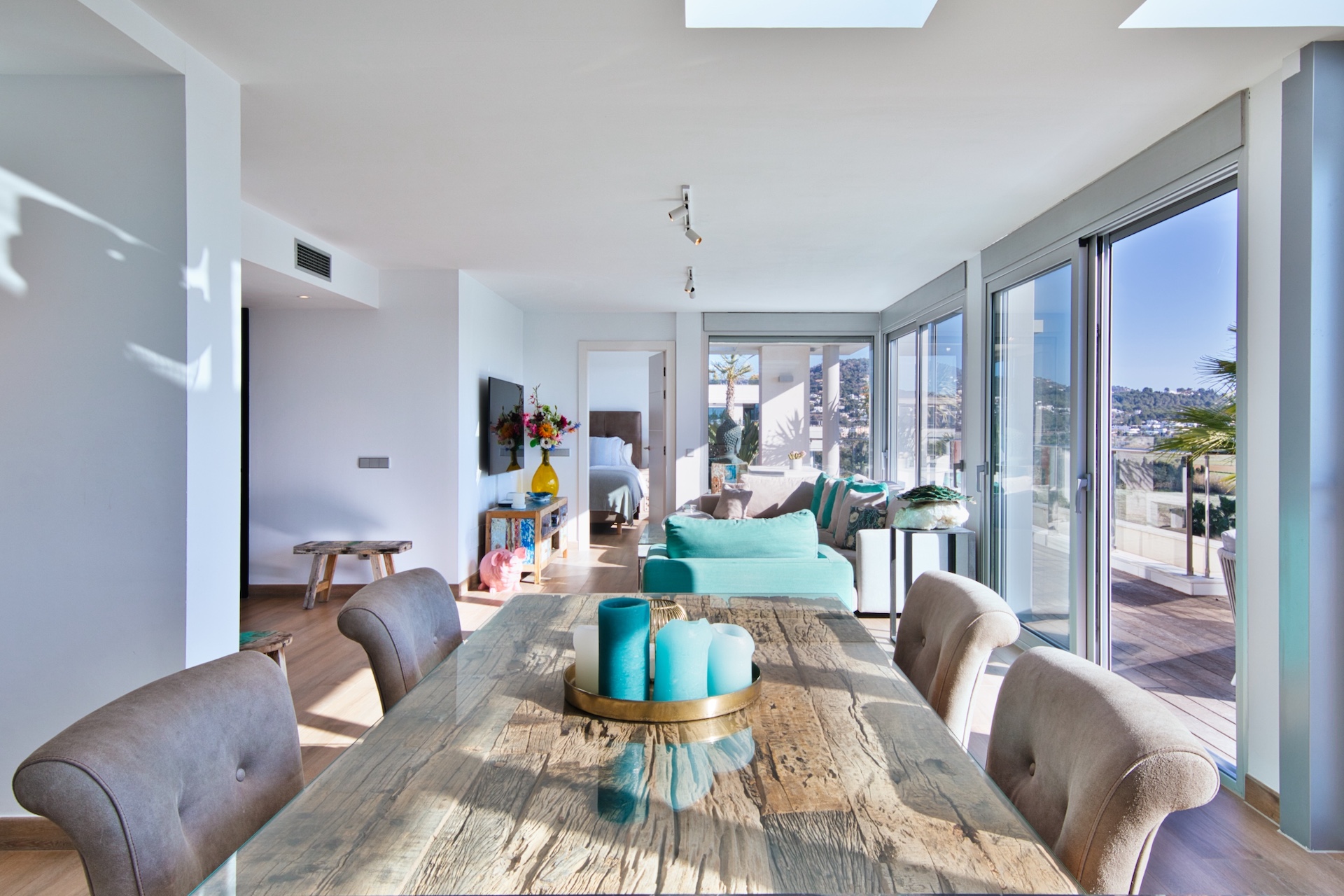 Resa Estates Ibiza te koop penthouse Marina botafoch for sale Ibiza dining table.jpeg